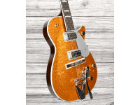 gretsch-g6129t-89-vintage-select-89-sparkle-jet-bigsby-rosewood-fingerboard-gold-sparkle_64b55b7a7a59d.jpg